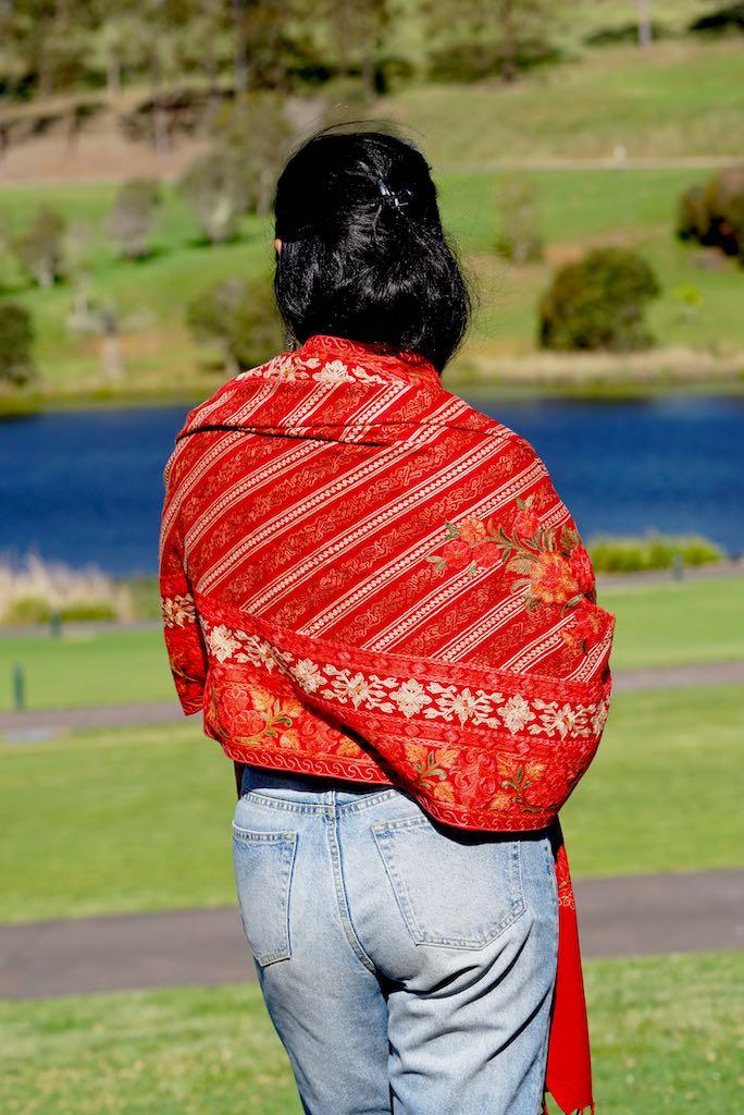 The touch of silk gives the pashmina an exceptional feel and a wonderful sheen. This beautiful bright red shawl is 28x80 cm in size perfect for anyone to wear at any occasion.