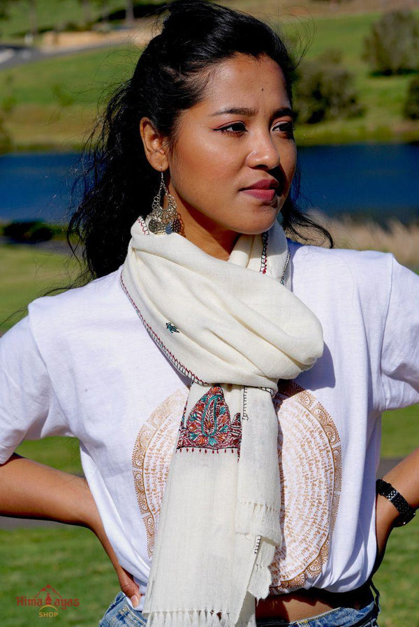 This shawl is very light in weight with little embroidered work , it is simple and elegant. White color pashmina shawl for everyday use.
