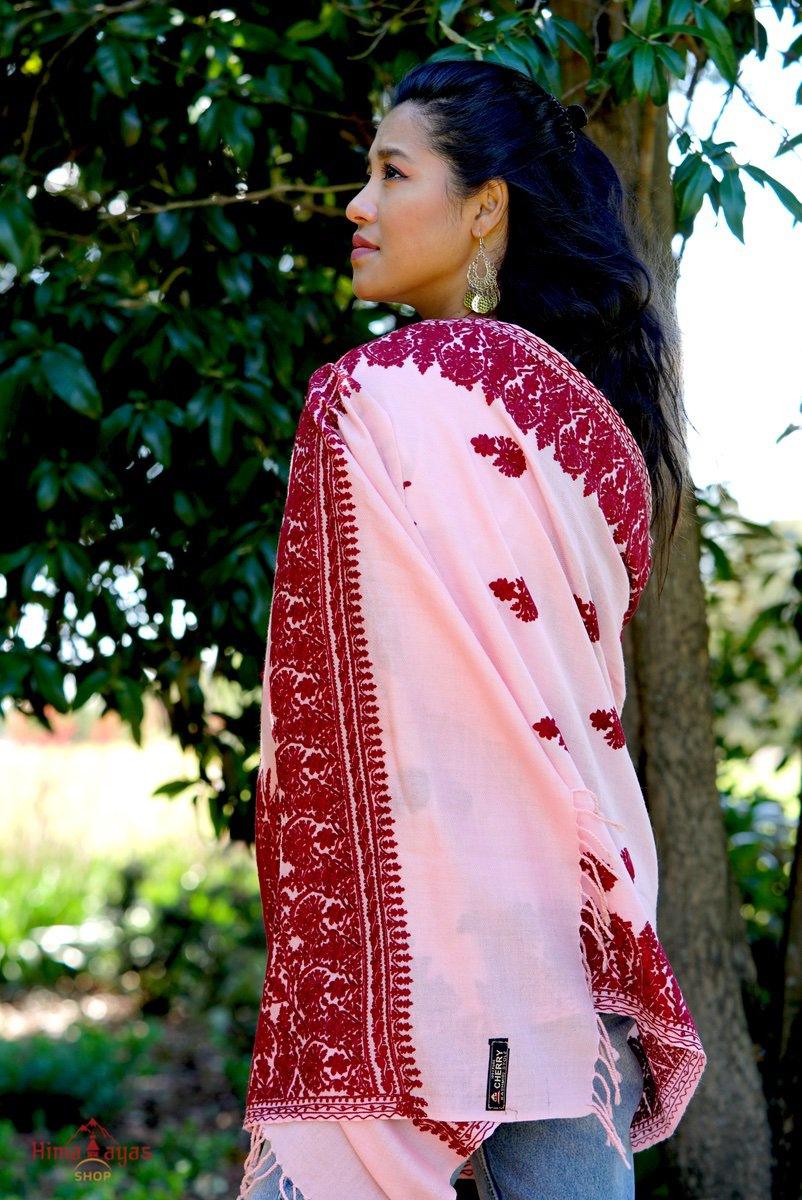 Rose pink embroidery pashmina shawl with red embroidery which most women will fall in love with. This beautiful pashmina shawl gives you a classy look to fall in love.