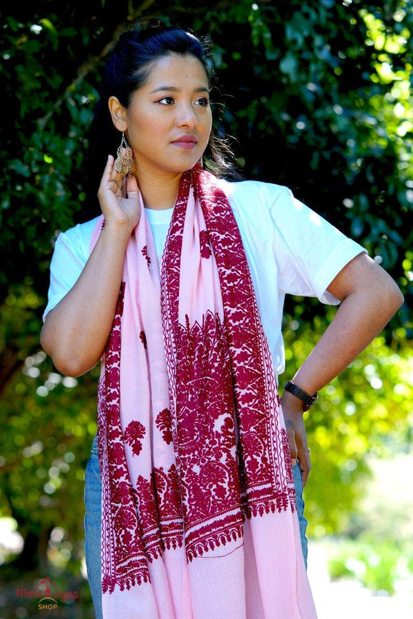 Rose pink embroidery pashmina shawl with red embroidery which most women will fall in love with. This beautiful pashmina shawl gives you a classy look to fall in love.
