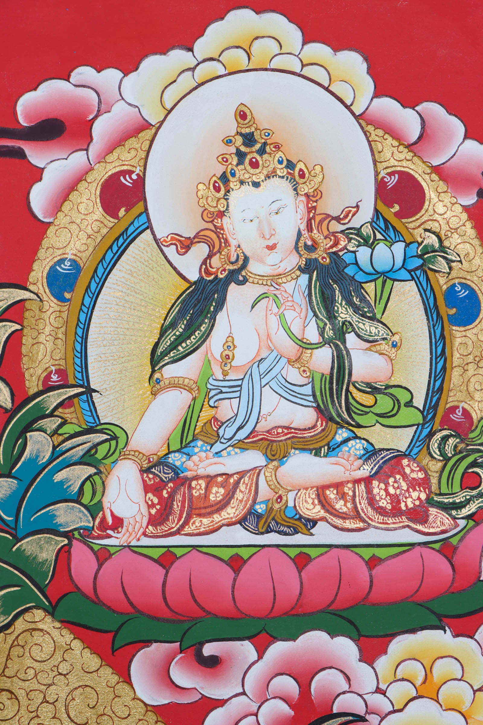 This Thangka features the iconic image of Manjushri, holding a sword and a book, representing the wisdom of the Buddhist teachings - Himalayas Shop