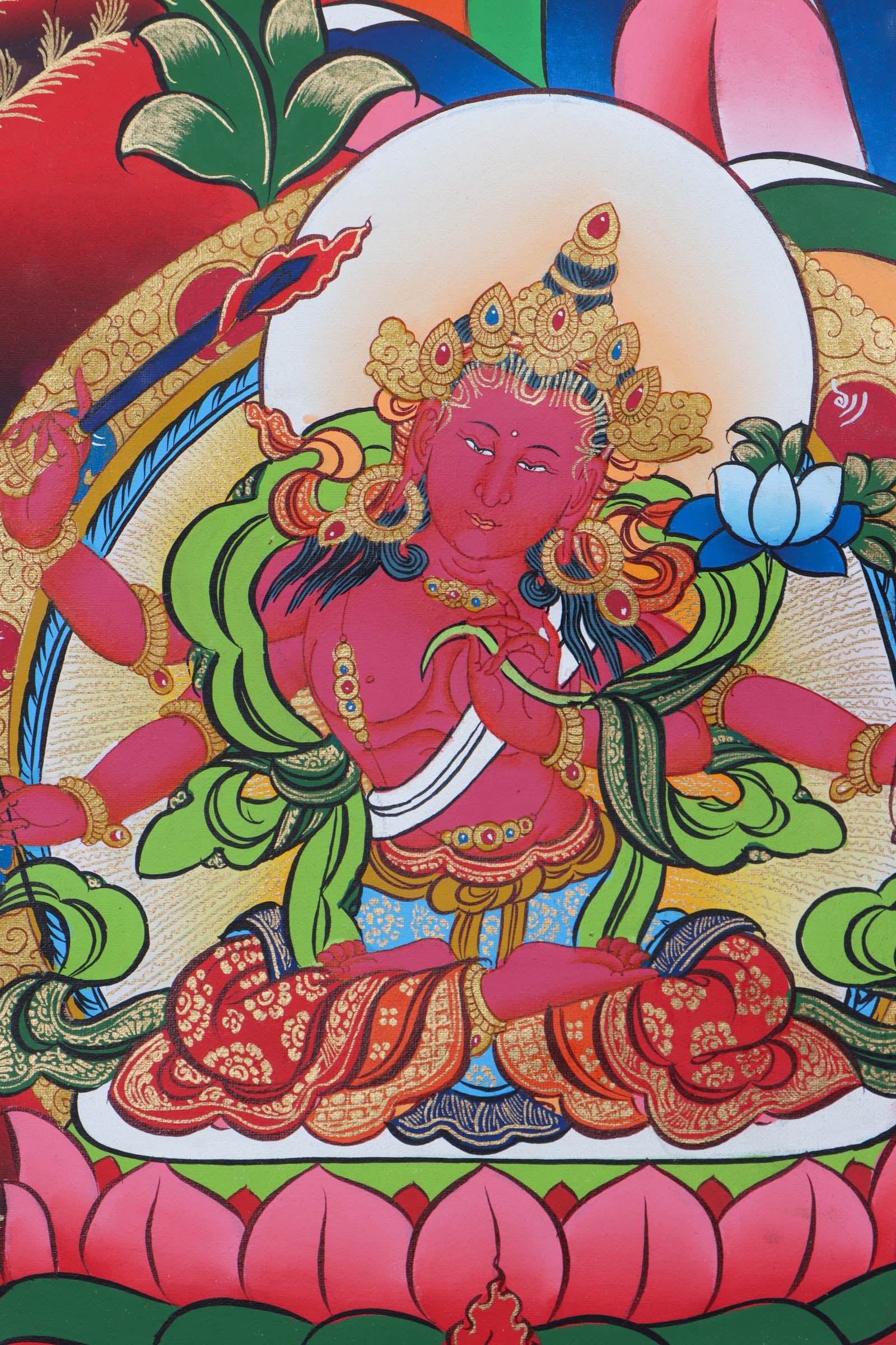 This Thangka features the iconic image of Manjushri, holding a sword and a book, representing the wisdom of the Buddhist teachings - Himalayas Shop