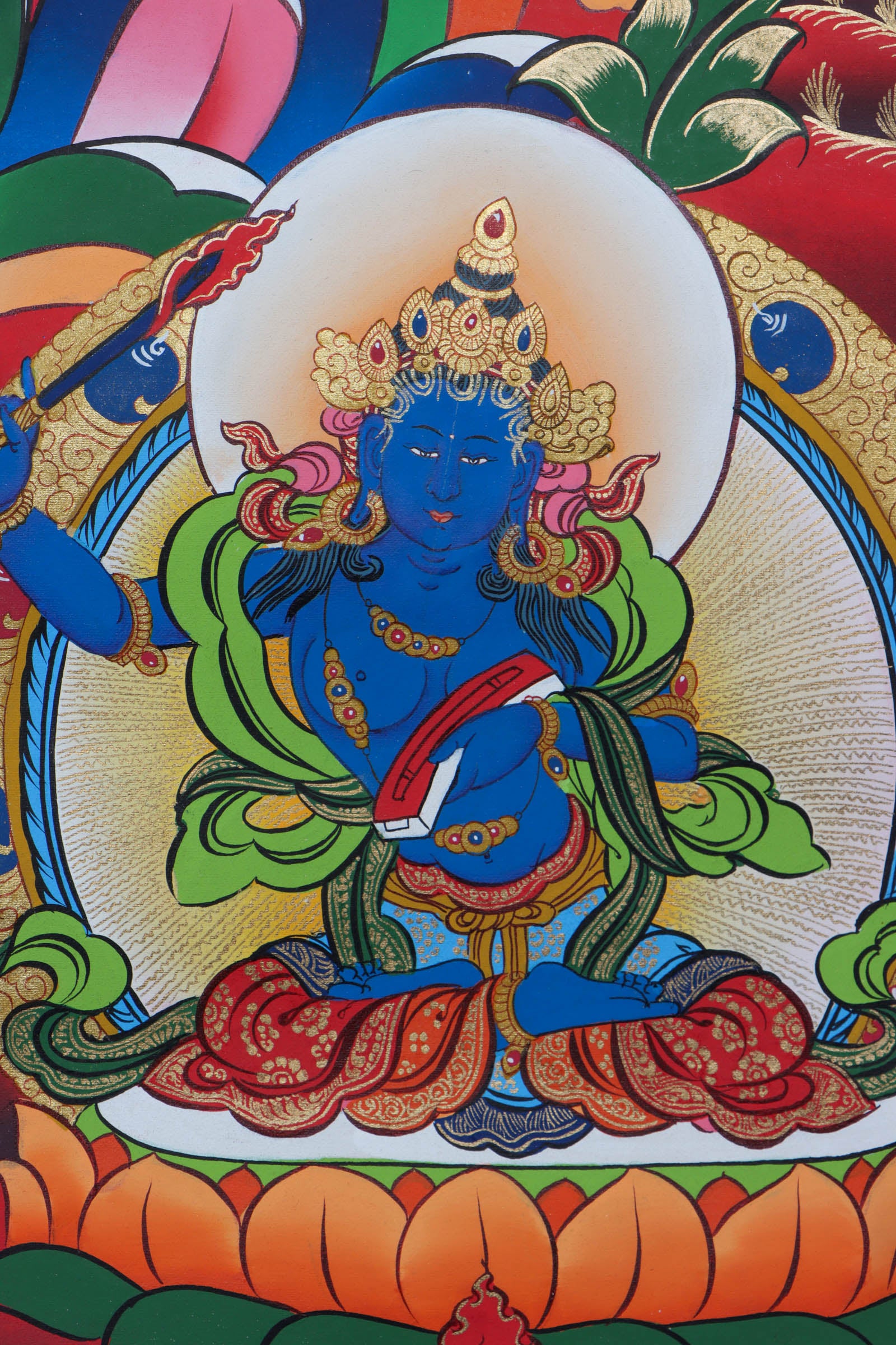 This Thangka features the iconic image of Manjushri, holding a sword and a book, representing the wisdom of the Buddhist teachings - Himalayas Shop