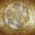 7 chakra symbol singing bowl
