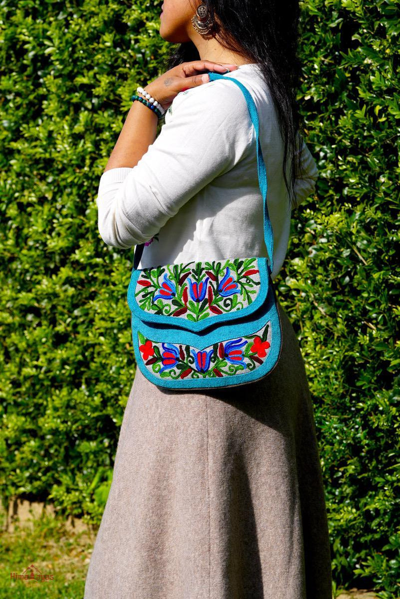 Beautiful handmade women's crossbody bag with floral embroidery design for chic style. 