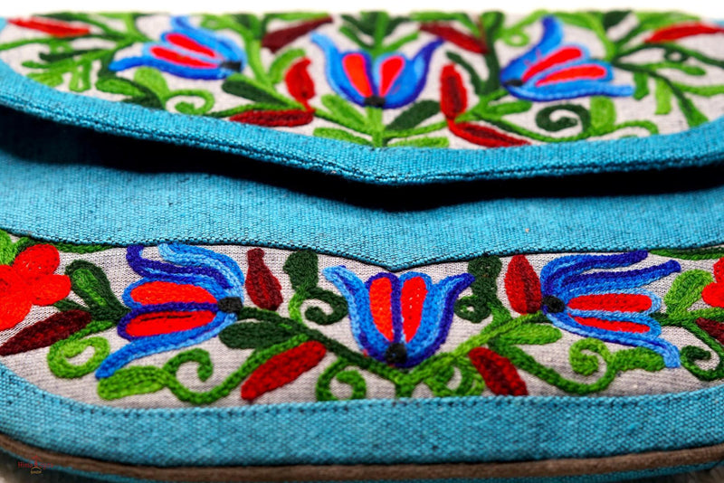 Beautiful handmade women's crossbody bag with floral embroidery design for chic style. 
