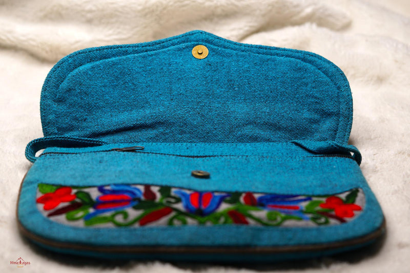 Beautiful handmade women's crossbody bag with floral embroidery design for chic style. 