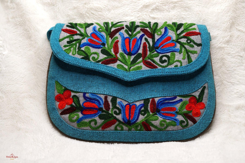 Beautiful handmade women's crossbody bag with floral embroidery design for chic style. 