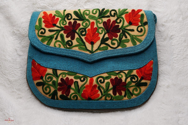 Beautiful handmade women's crossbody bag with floral embroidery design for chic boho style. 