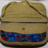 Beautiful hand embroidered crossbody bag with bright and multi-colour embroidered floral patterns.