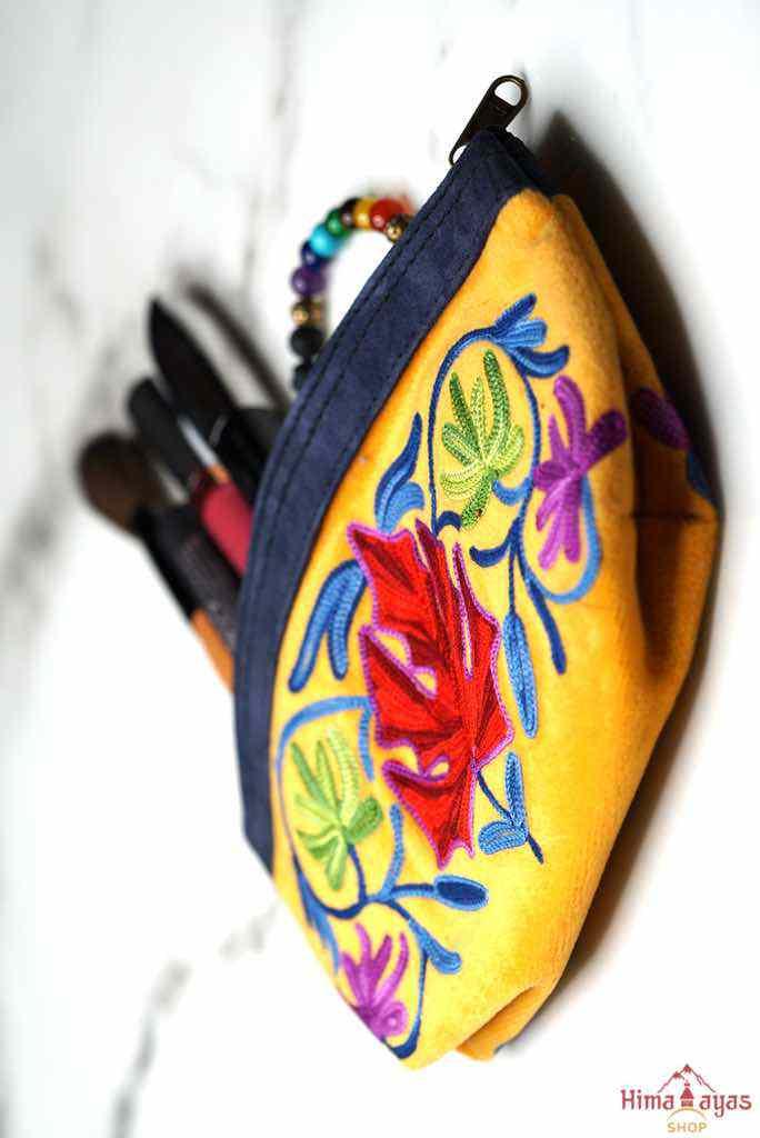 A special women pouch very light weight, ideal as a makeup bag or everyday use hand purse.