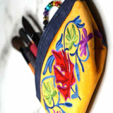 A special women pouch very light weight, ideal as a makeup bag or everyday use hand purse.