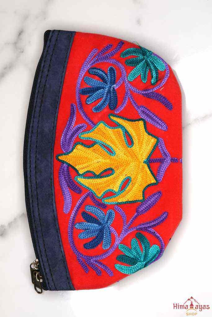 A special women pouch very light weight, ideal as a makeup bag or everyday use hand purse.
