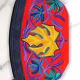 A special women pouch very light weight, ideal as a makeup bag or everyday use hand purse.