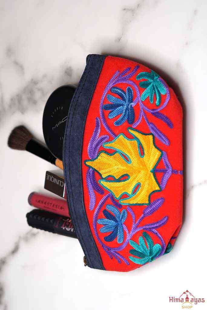 A special women pouch very light weight, ideal as a makeup bag or everyday use hand purse.