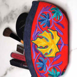 A special women pouch very light weight, ideal as a makeup bag or everyday use hand purse.