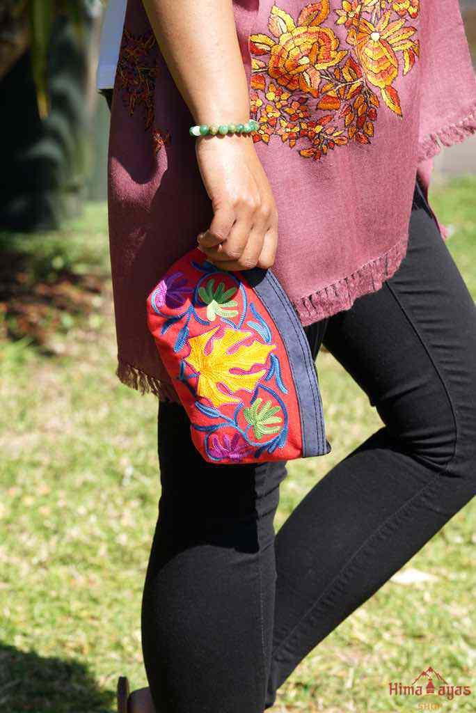 A special women pouch very light weight, ideal as a makeup bag or everyday use hand purse.
