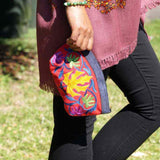 A special women pouch very light weight, ideal as a makeup bag or everyday use hand purse.