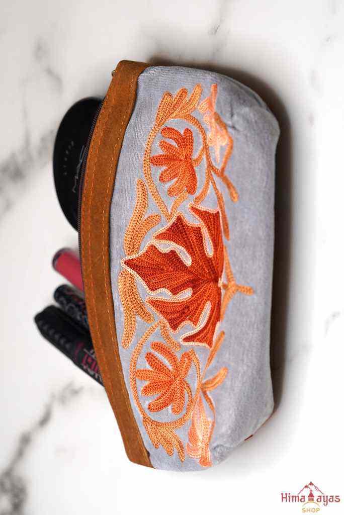 A special women pouch very light weight, ideal as a makeup bag or everyday use hand purse.