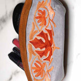 A special women pouch very light weight, ideal as a makeup bag or everyday use hand purse.