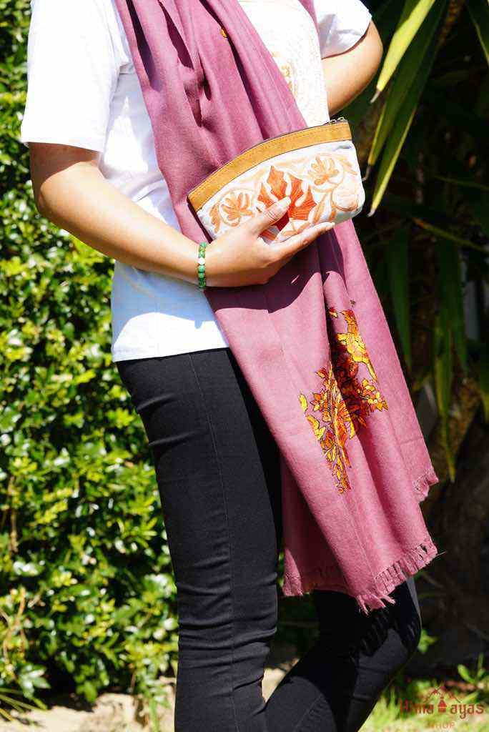 A special women pouch very light weight, ideal as a makeup bag or everyday use hand purse.