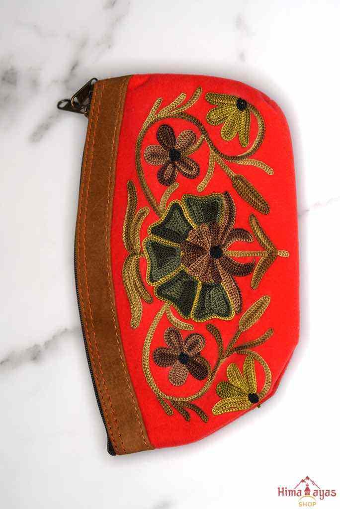 Women pouch purse with floral pattern, ultra-soft and lightweight. The pouch can be used as makeup bag or clutch that suit your style. Ethically made in Nepal.