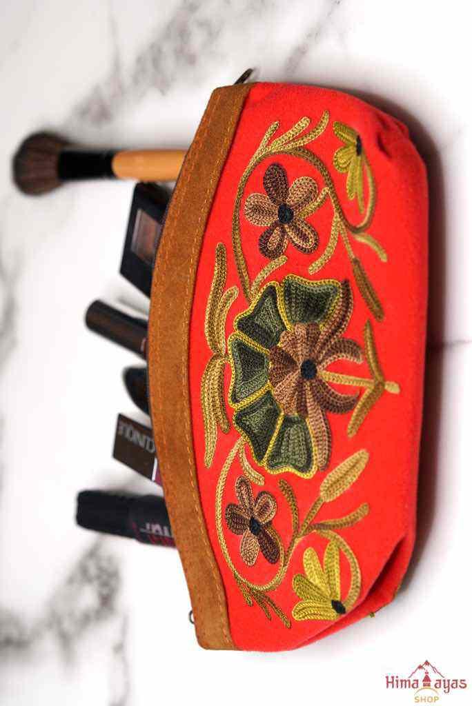 Women pouch purse with floral pattern, ultra-soft and lightweight. The pouch can be used as makeup bag or clutch that suit your style. Ethically made in Nepal.