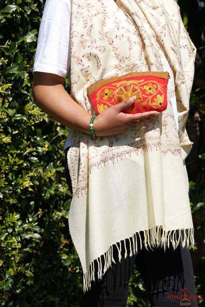 Women pouch purse with floral pattern, ultra-soft and lightweight. The pouch can be used as makeup bag or clutch that suit your style. Ethically made in Nepal.