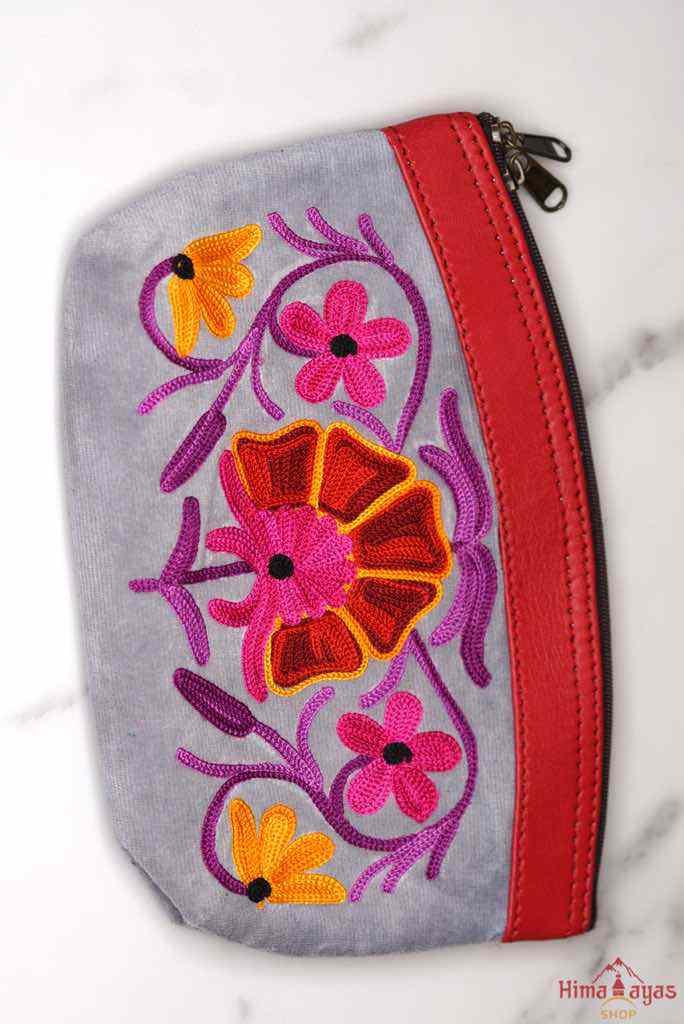 Women pouch purse with floral pattern, ultra-soft and lightweight. The pouch can be used as makeup bag or clutch that suit your style. Ethically made in Nepal.