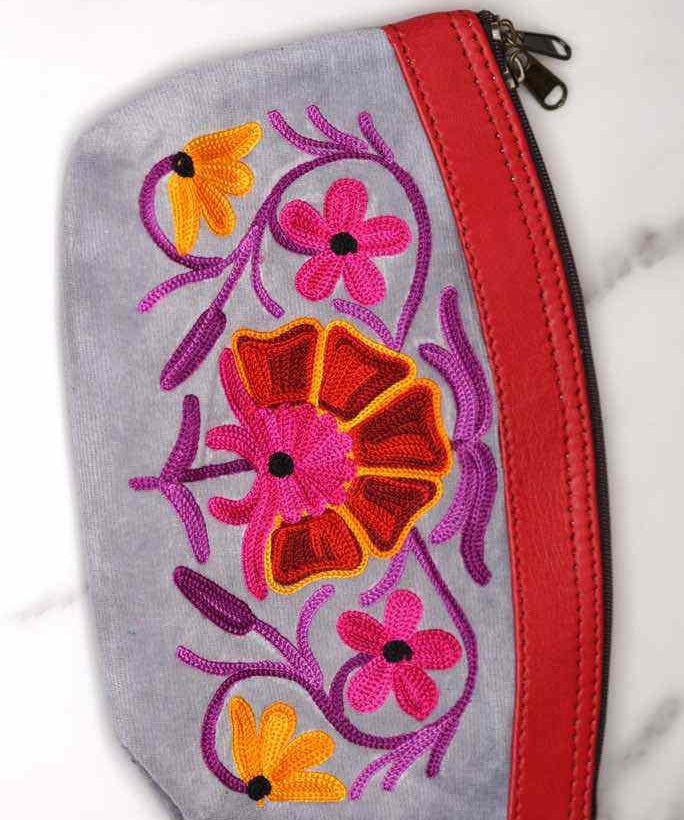 Women pouch purse with floral pattern, ultra-soft and lightweight. The pouch can be used as makeup bag or clutch that suit your style. Ethically made in Nepal.