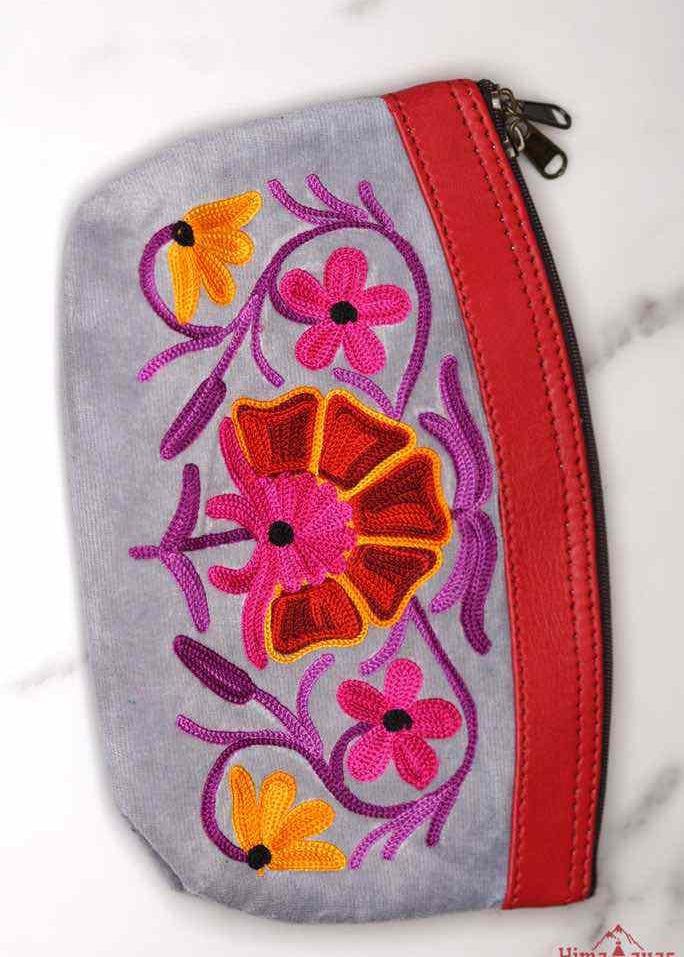 Women pouch purse with floral pattern, ultra-soft and lightweight. The pouch can be used as makeup bag or clutch that suit your style. Ethically made in Nepal.