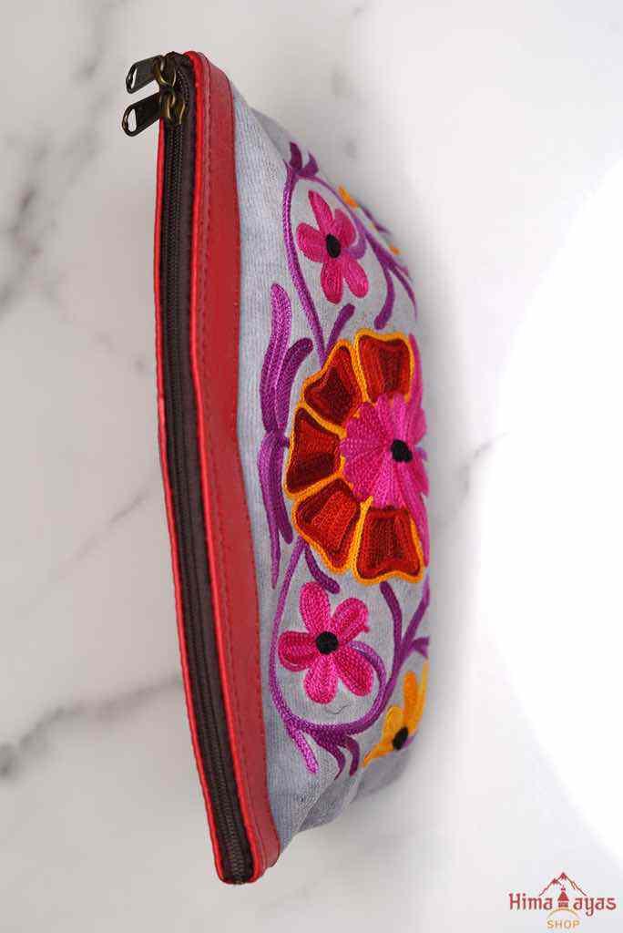Women pouch purse with floral pattern, ultra-soft and lightweight. The pouch can be used as makeup bag or clutch that suit your style. Ethically made in Nepal.