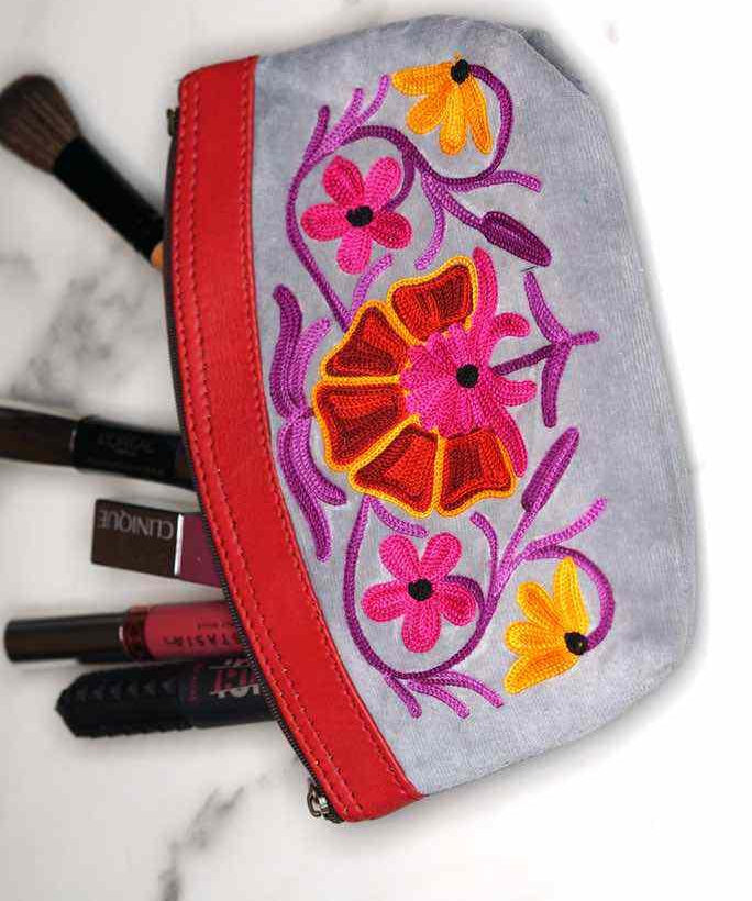 Women pouch purse with floral pattern, ultra-soft and lightweight. The pouch can be used as makeup bag or clutch that suit your style. Ethically made in Nepal.