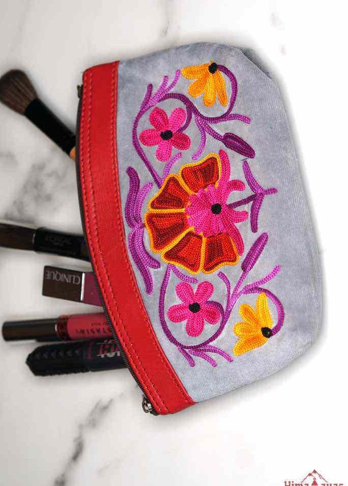 Women pouch purse with floral pattern, ultra-soft and lightweight. The pouch can be used as makeup bag or clutch that suit your style. Ethically made in Nepal.