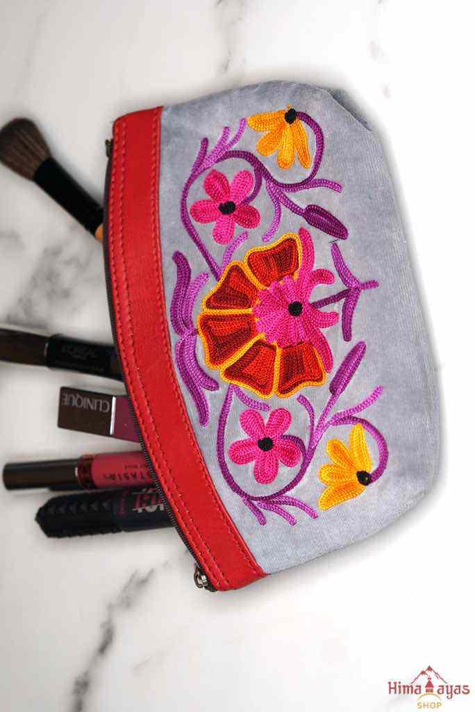 Women pouch purse with floral pattern, ultra-soft and lightweight. The pouch can be used as makeup bag or clutch that suit your style. Ethically made in Nepal.