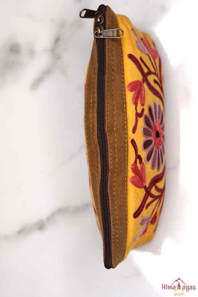 Beautiful Cashmere design women pouch made with hand-embroidery design with a very fine embellishment that involves elaborate and intricate floral motifs. 