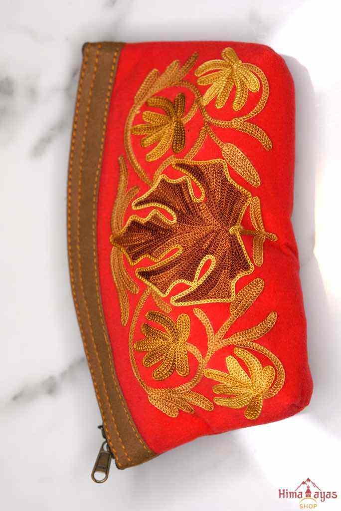A special women pouch very light weight, ideal as a makeup bag or everyday use hand purse.