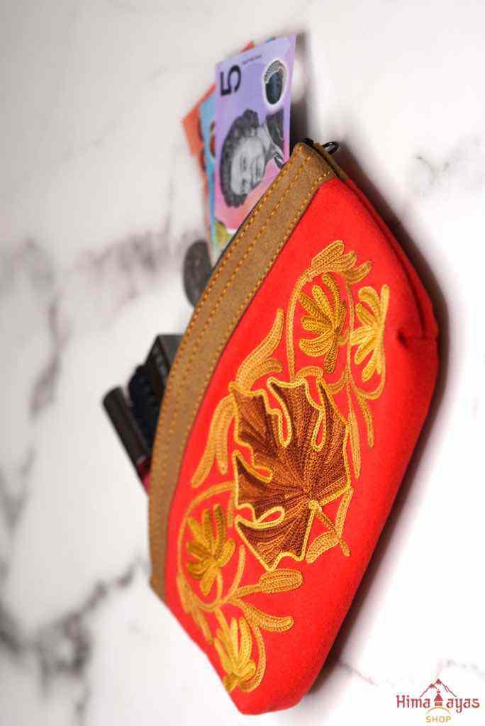 A special women pouch very light weight, ideal as a makeup bag or everyday use hand purse.
