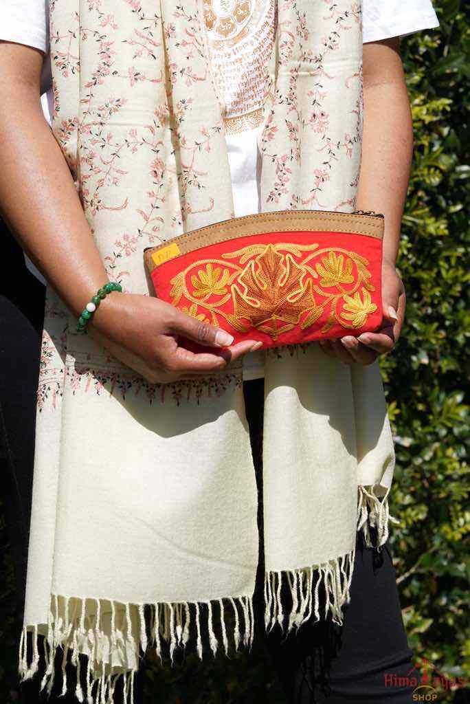 A special women pouch very light weight, ideal as a makeup bag or everyday use hand purse.