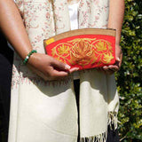 A special women pouch very light weight, ideal as a makeup bag or everyday use hand purse.