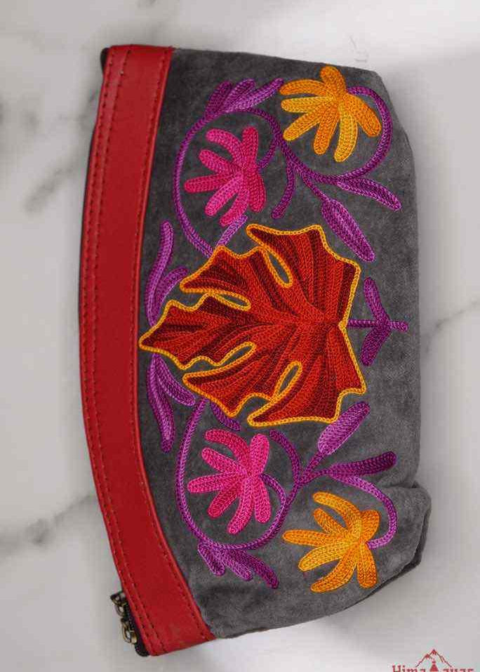 A special women pouch very light weight, ideal as a makeup bag or everyday use hand purse.