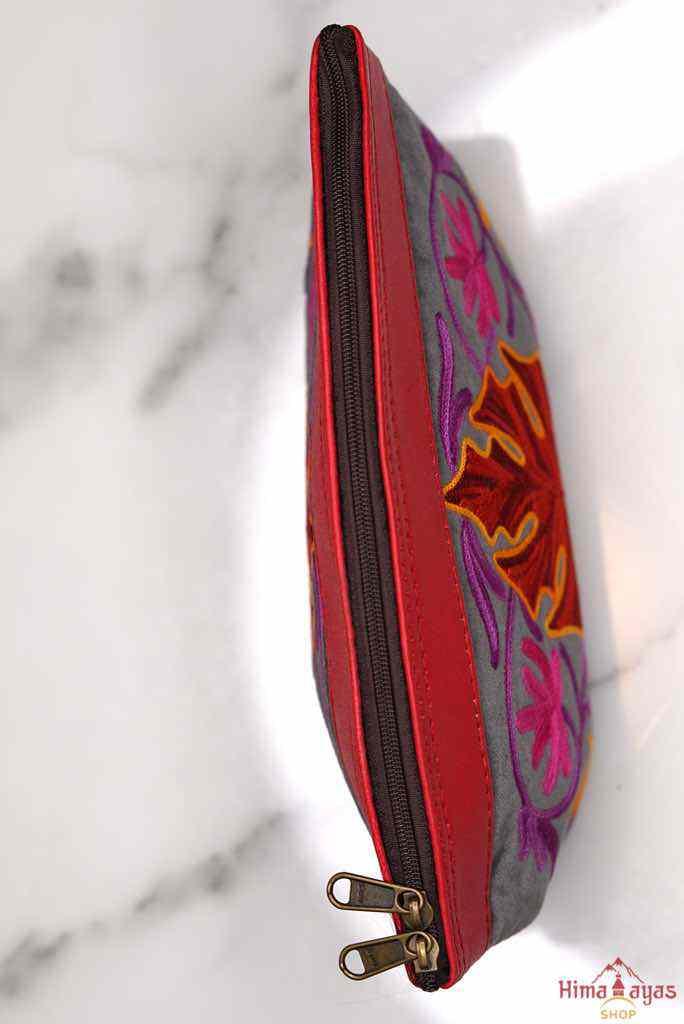 A special women pouch very light weight, ideal as a makeup bag or everyday use hand purse.