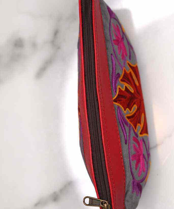 A special women pouch very light weight, ideal as a makeup bag or everyday use hand purse.