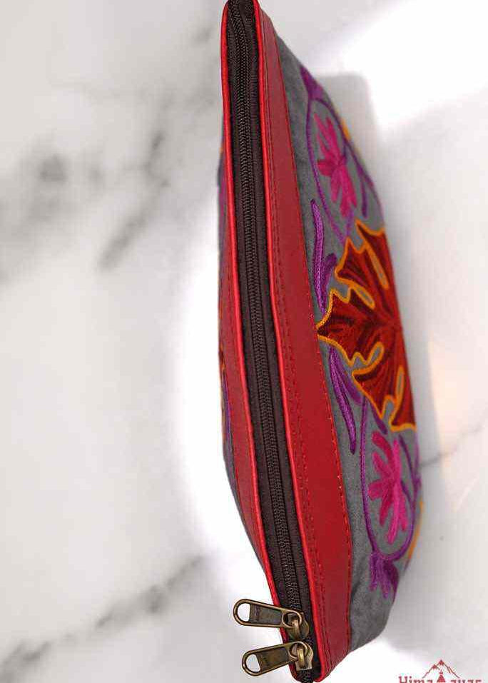 A special women pouch very light weight, ideal as a makeup bag or everyday use hand purse.