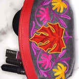 A special women pouch very light weight, ideal as a makeup bag or everyday use hand purse.