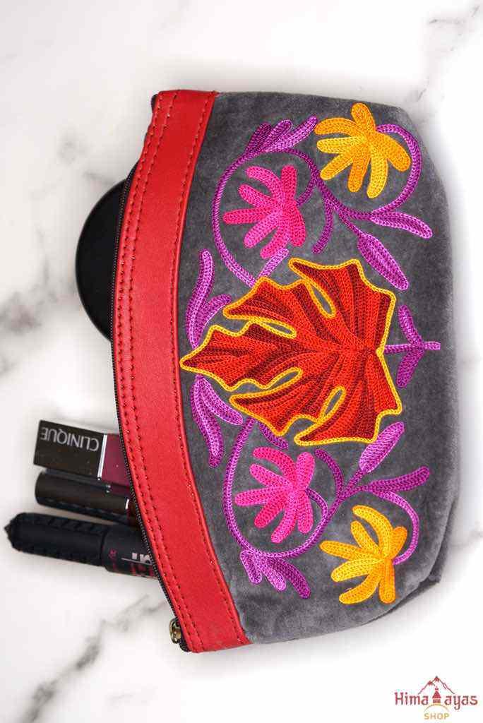 A special women pouch very light weight, ideal as a makeup bag or everyday use hand purse.