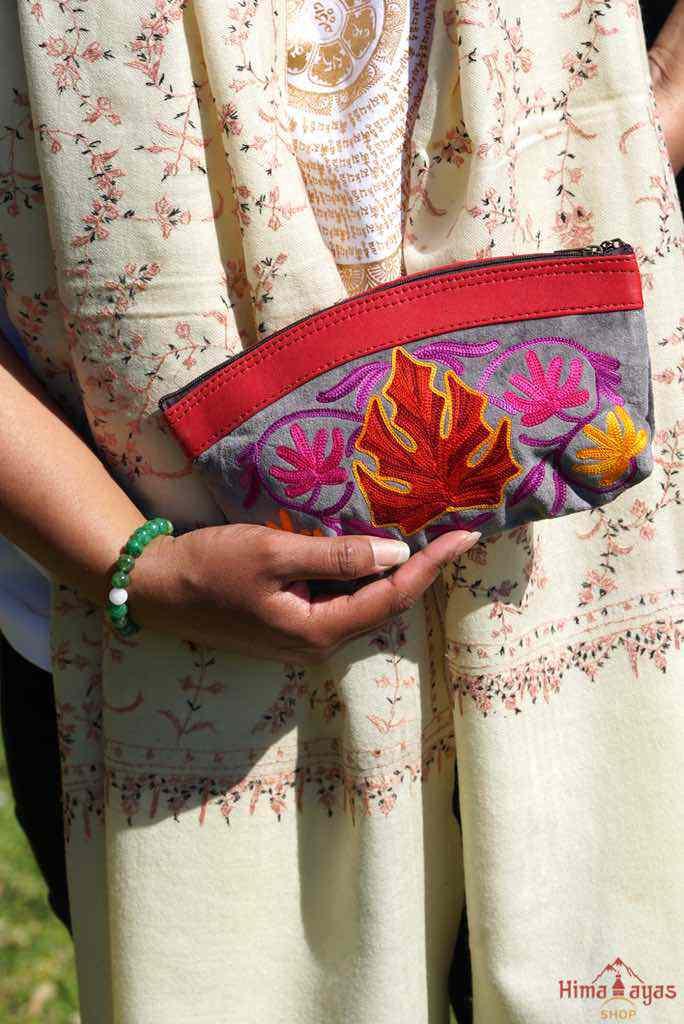 A special women pouch very light weight, ideal as a makeup bag or everyday use hand purse.