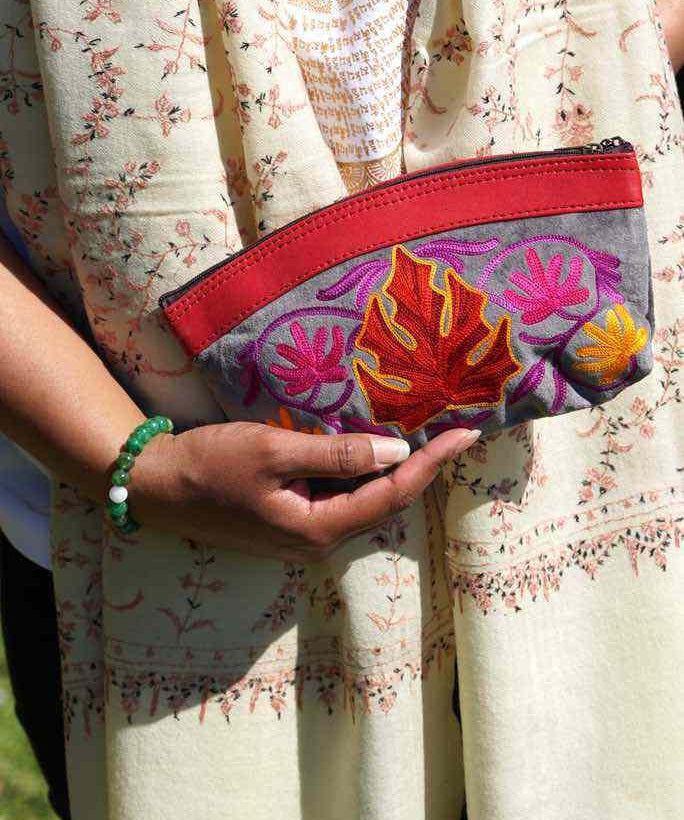 A special women pouch very light weight, ideal as a makeup bag or everyday use hand purse.