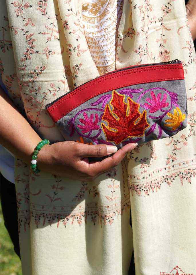 A special women pouch very light weight, ideal as a makeup bag or everyday use hand purse.