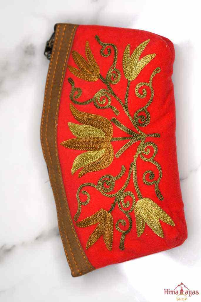 Beautiful Cashmere design pouch made with hand-embroidery design with a very fine embellishment that involves elaborate and intricate floral motifs. 